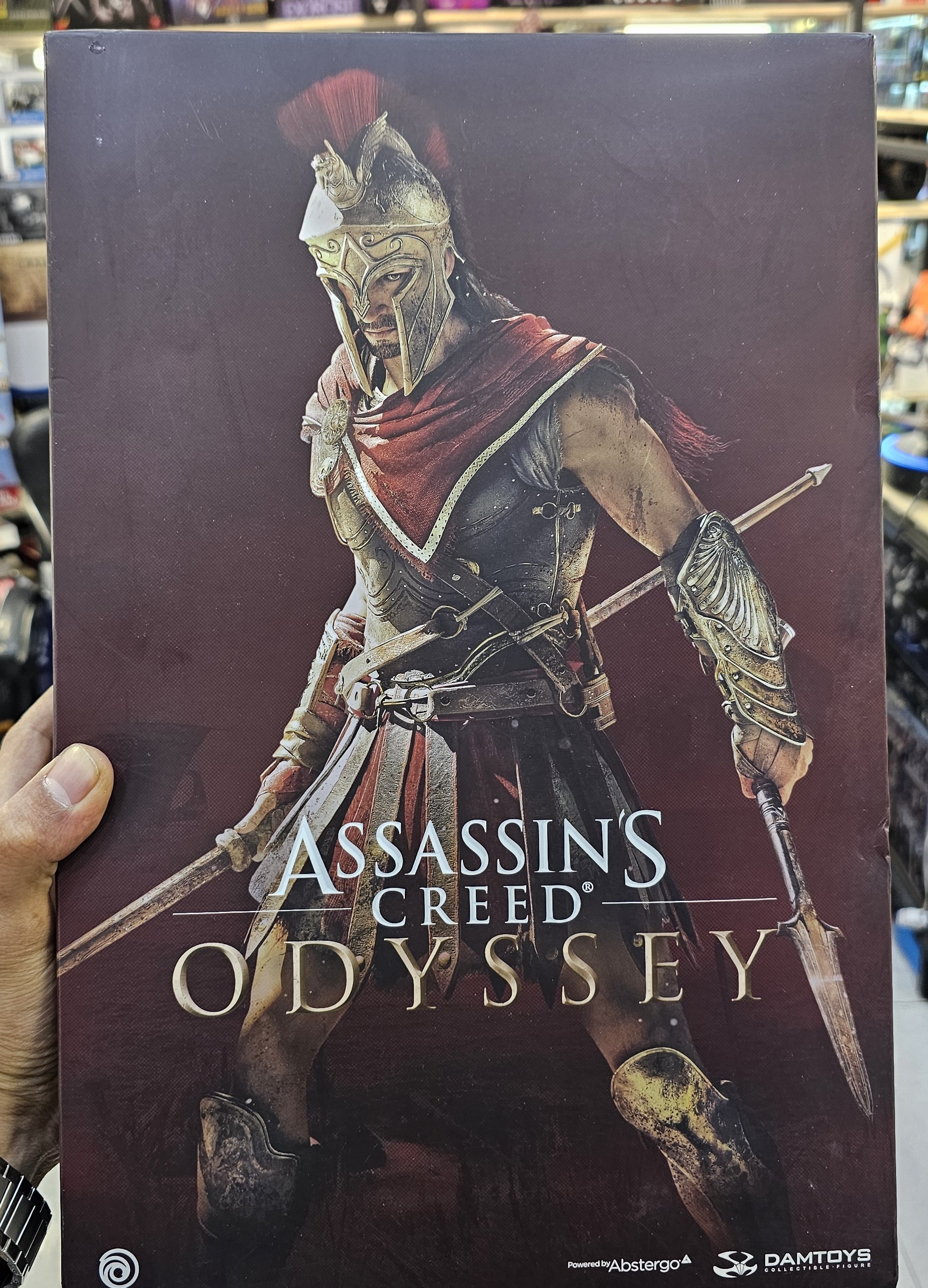 اکشن فیگور اساسین کرید الکسیوس بازی اودیسه برند دام توی مدل Assassin's Creed Odyssey Damtoys