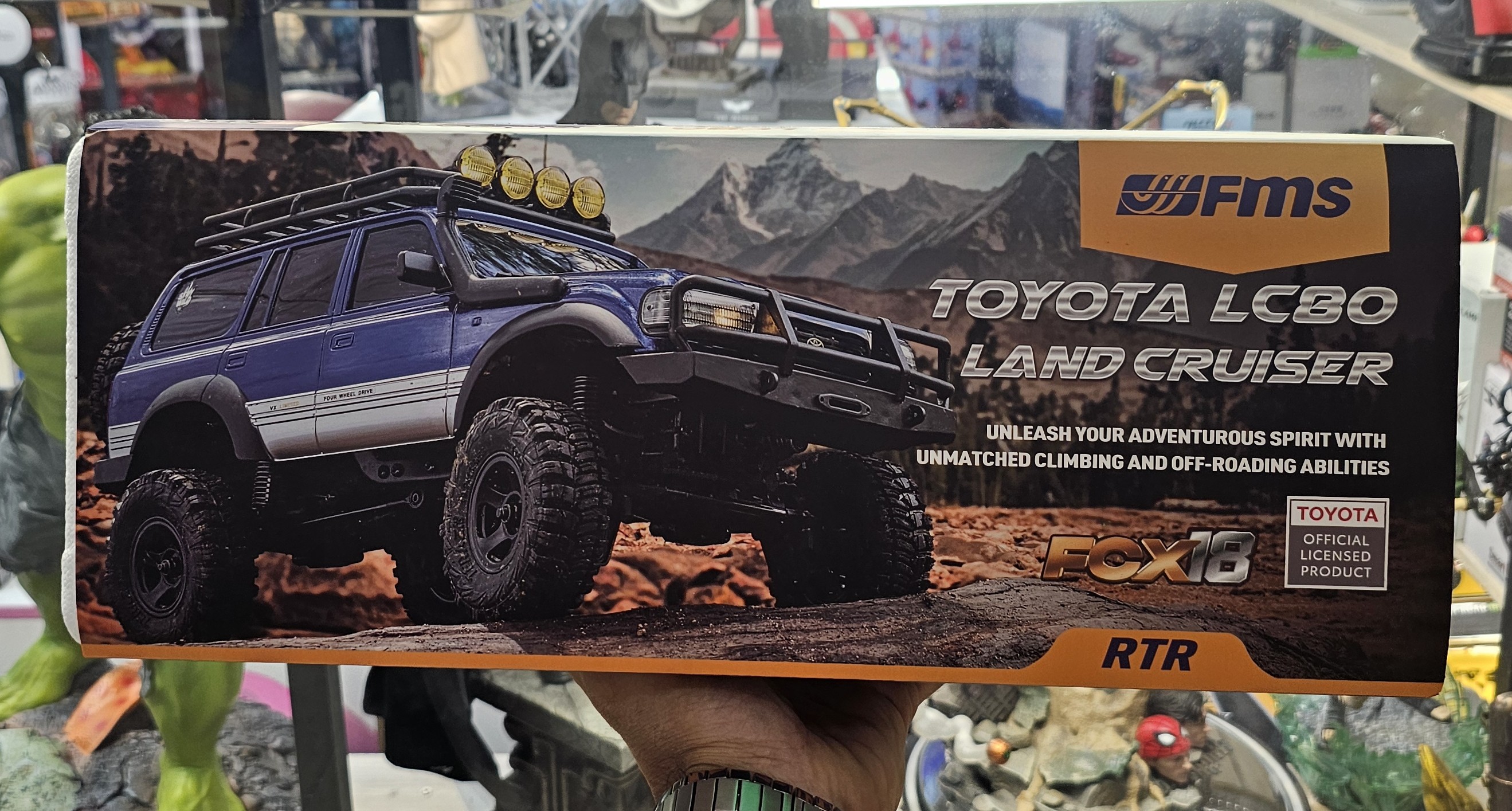 ماشین کنترلی آفرود صخره نورد تویوتا لندکروز زرد مدل FMS Toyota Landcruiser LC80 1/18