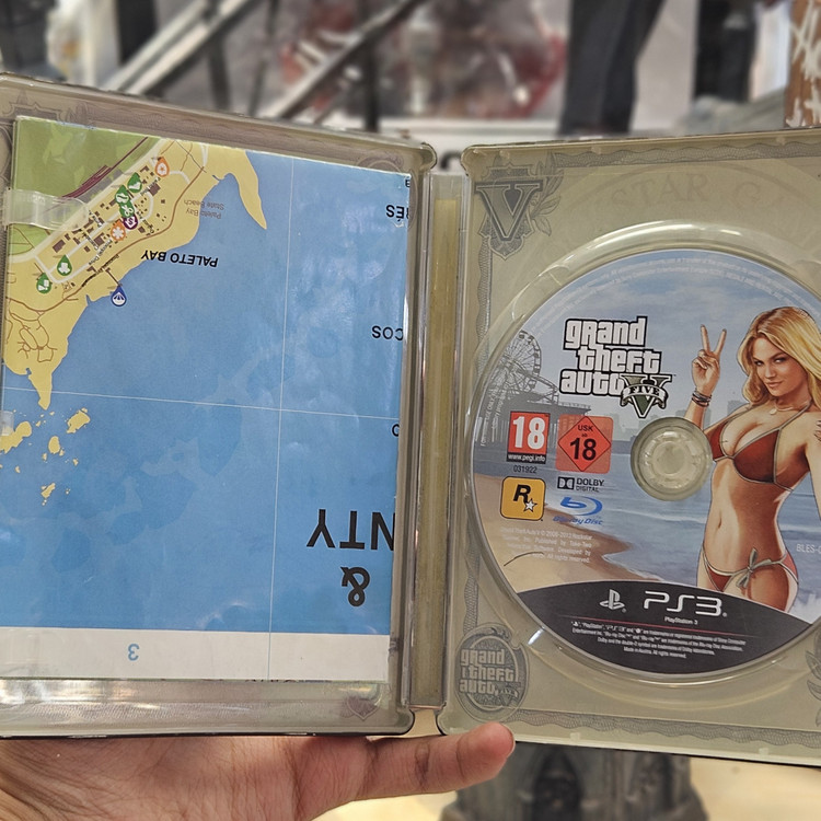 استیل بوک همراه دیسک بازی جی تی ای پنج برای Ps3 مدل Grand Theft Auto V Steelbook Ps3